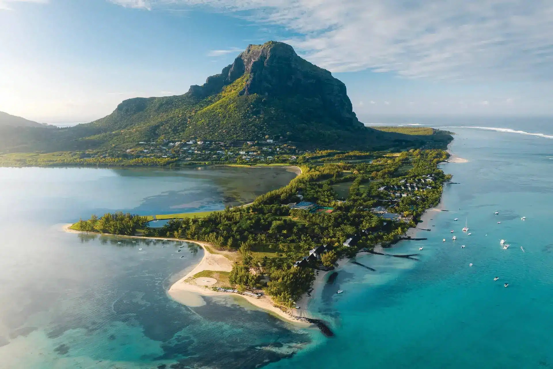 Aerial view of Le Morne Peninsula and Le Morne Brabant, with turquoise lagoons and beaches in Mauritius.