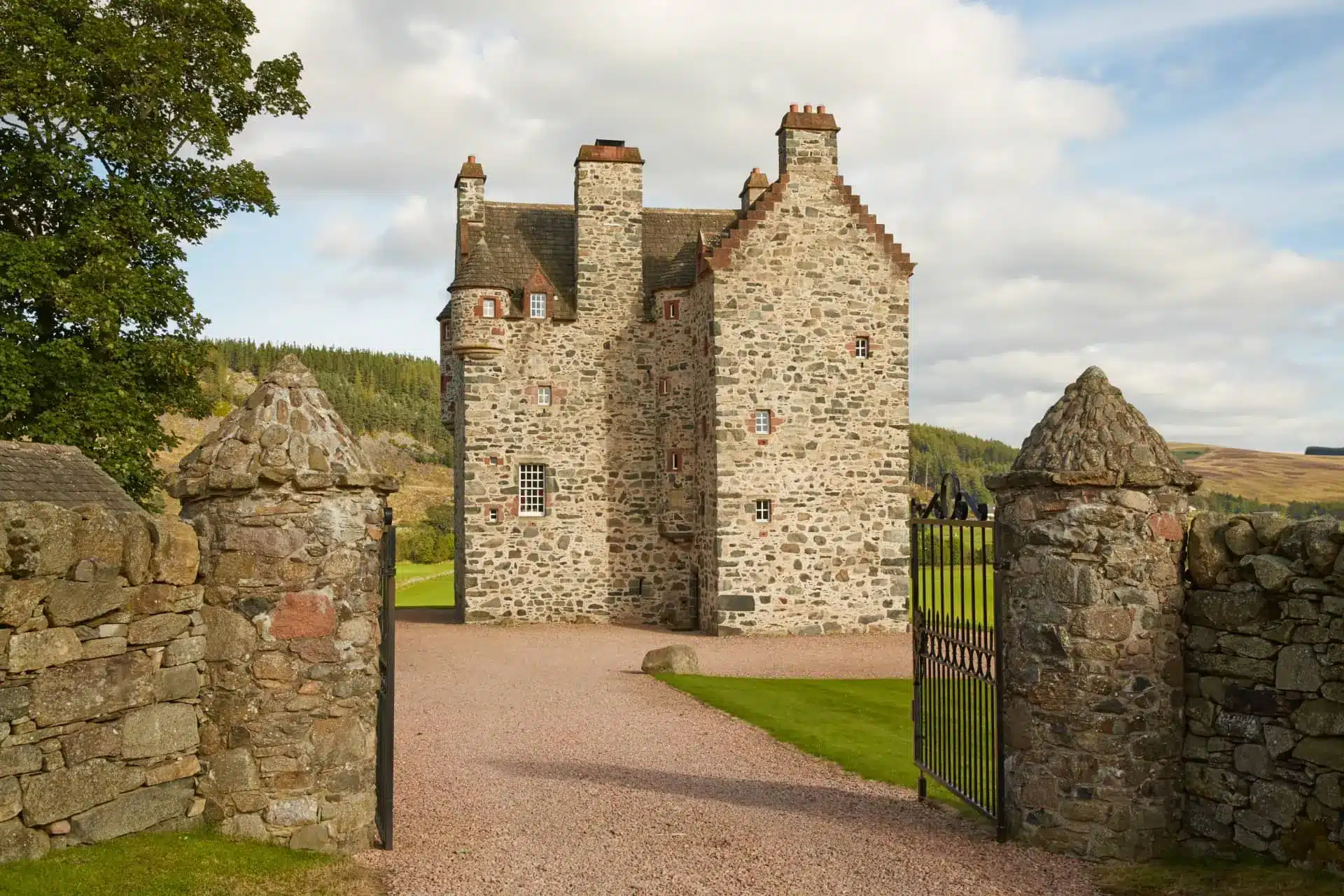 The Fortalice’s stone castle towers viewed through its open entrance gate